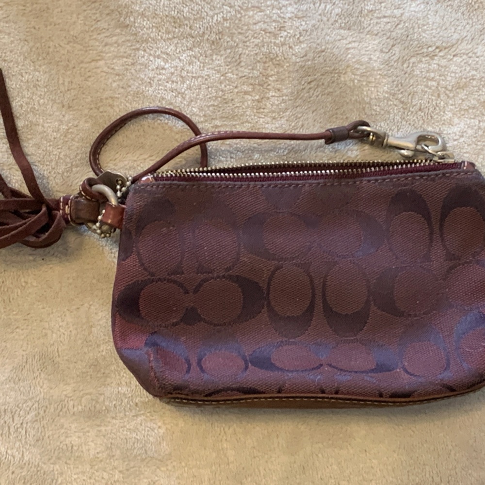 Small Maroon Coach Wristlet in fair condition